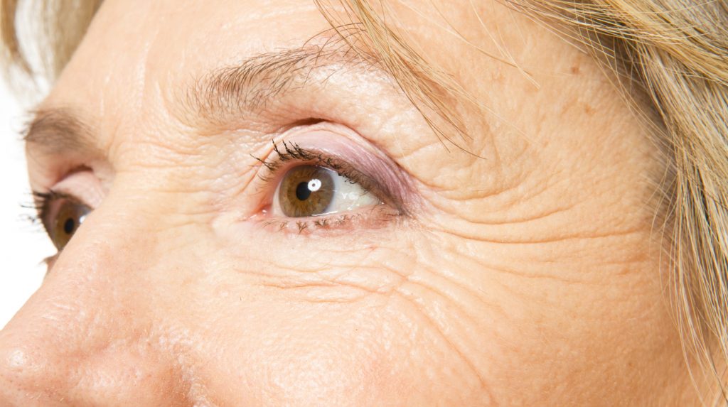 Close-up on an older woman's eyes and eyelids